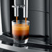 Jura Piano Black E4 Superautomatic Espresso Machine - Brewing Close Up